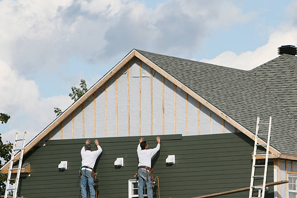 Professional Siding Repair technician working in Wellesley Hills, MA